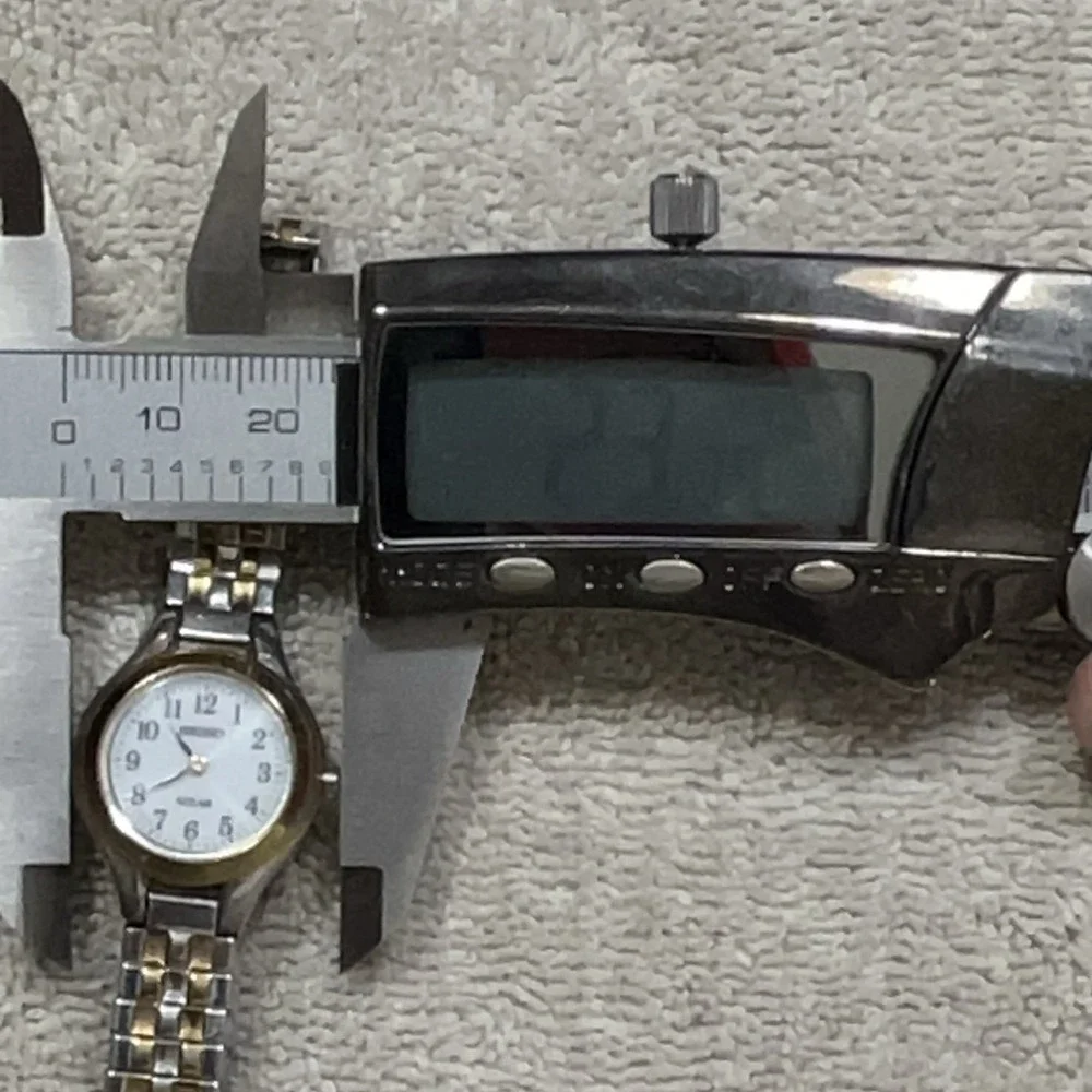 Seiko SUP100 Women's Core Solar White Dial‎ Wrist Watch Running/Working 23mm VTG